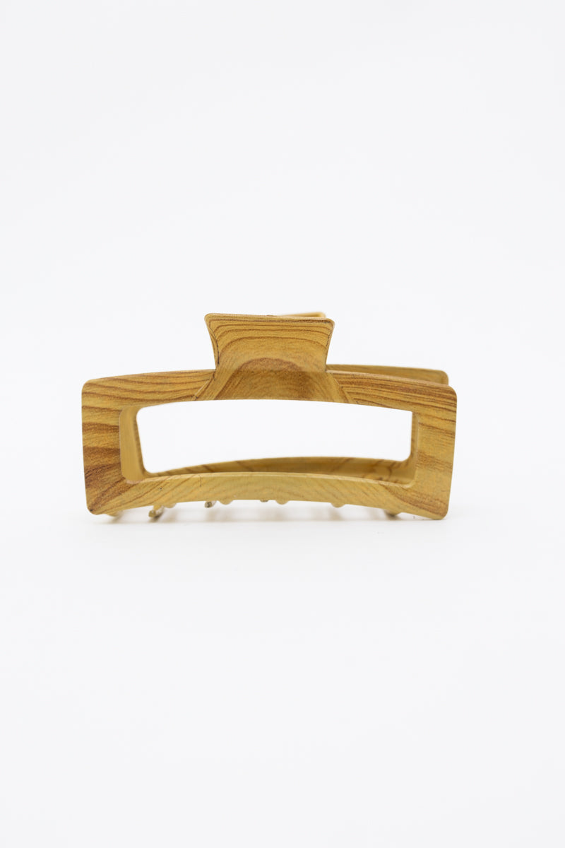 Retro wood print metal hair claw clip with stylish design.