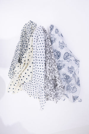 Light printed small pattern neck scarf, a stylish accessory for any outfit.