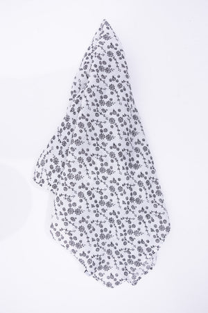 Soft fabric flower neck scarf with small patterns for everyday wear.