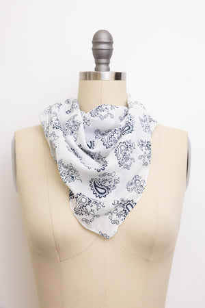 Light paisley printed neck scarf with versatile and elegant style options.