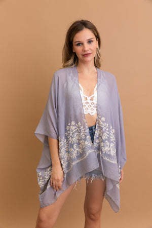 Stylish Enchanted Bloom Blue kimono perfect for layering and comfort.