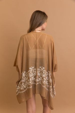 Floral stitch mocha kimono for layering and comfortable wear.