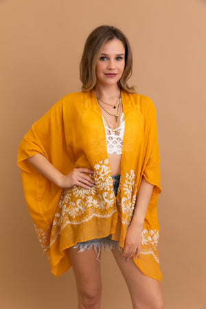 Sophisticated mustard floral kimono with lightweight and durable design.