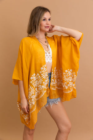 Elegant and lightweight Enchanted Mustard Bloom kimono for versatile style.