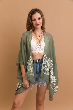 Breathable sage floral embroidered kimono with viscose polyester blend.