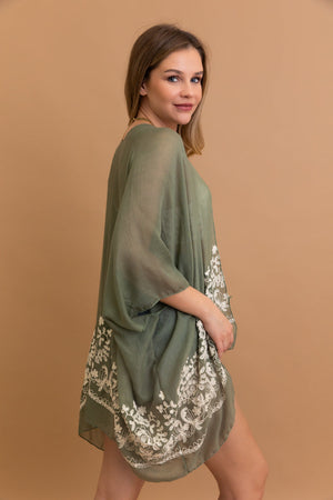 Lightweight floral embroidered sage kimono with detailed stitching.
