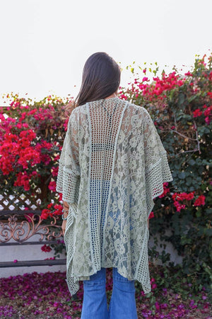 Elegant floral knit sage kimono for layering and comfort.