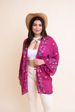 Breathable anemone floral fuchsia kimono with open-front design.